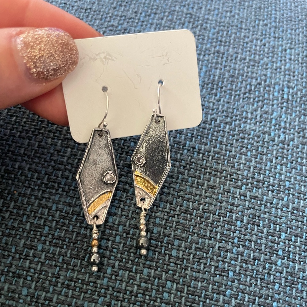 $ firm Geometric earrings